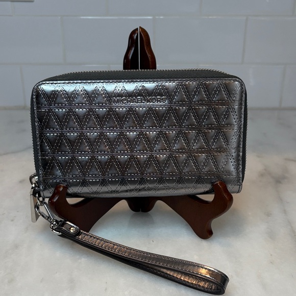 Michael Kors Handbags - Michael Kors Metallic Geometric Embossed Wristlet Full Wallet